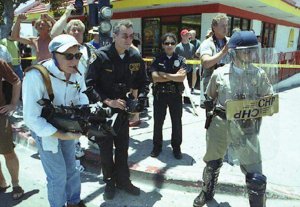 Police filming demon...