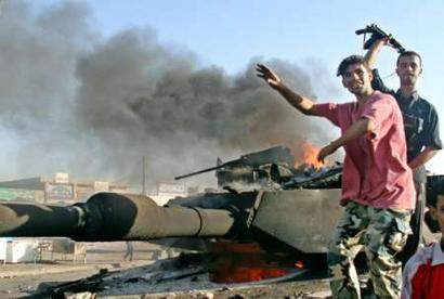 Iraqi youths celebra...