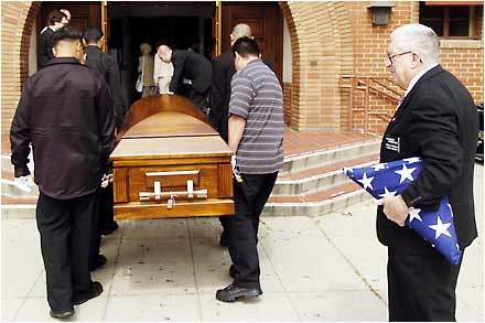 Pallbearers Carry th...