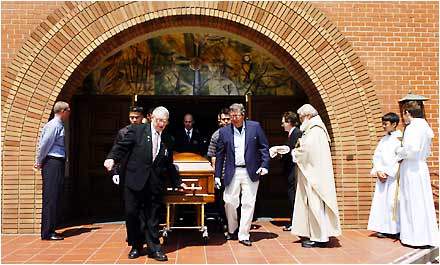 Pallbearers Carry th...