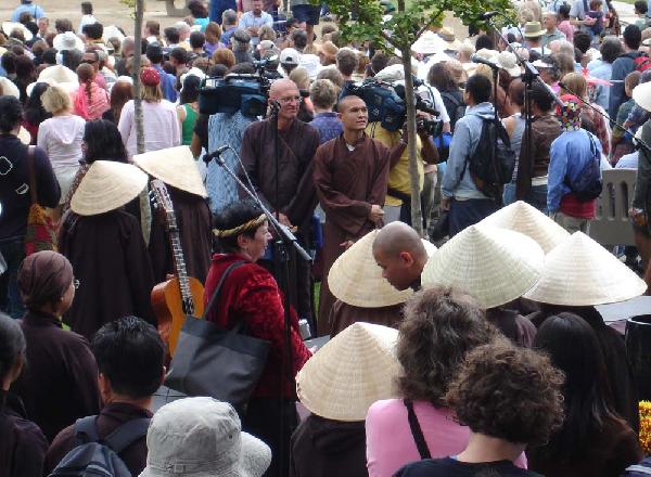 Monks Watch as Crowd...