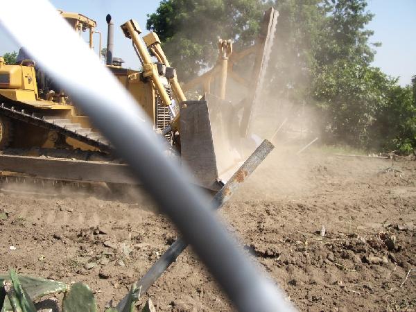 bulldozing begins ag...