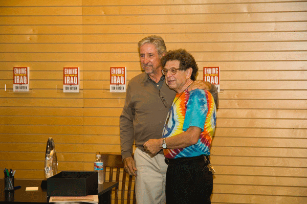 Tom Hayden receives ...