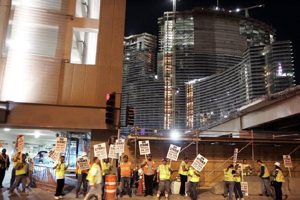 Workers walk off MGM...