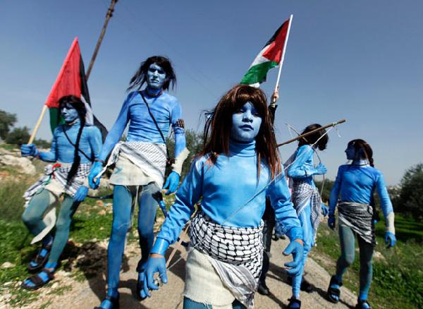 Palestinians dressed...