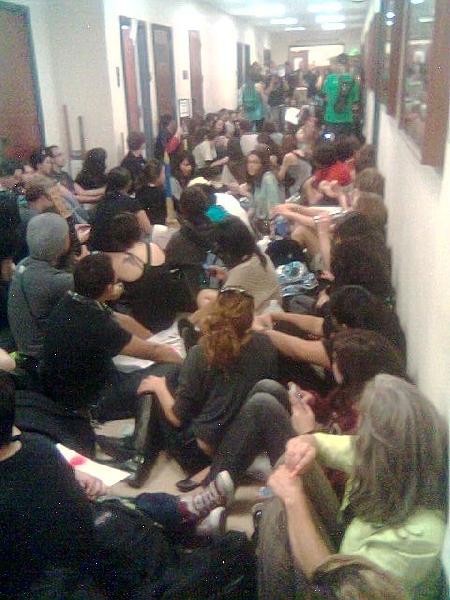 Students sit in at U...