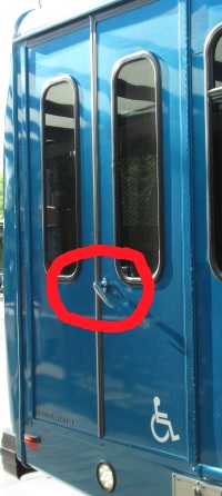 Secret anti-theft devices on Orbit buses at Tempe Transit Center. The drivers turn the handle on the back door which prevents the bus from moving until the handler is fully closed. Cocking the handle turns on an interlock safety device which prevents the bus from moving