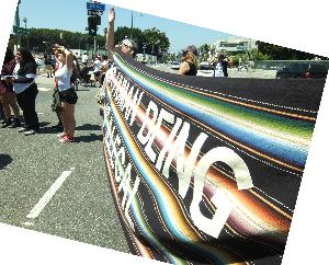 Blanket Fabric Banner: No Human Being Is Illegal