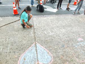 Girl Chalking Sidewalk